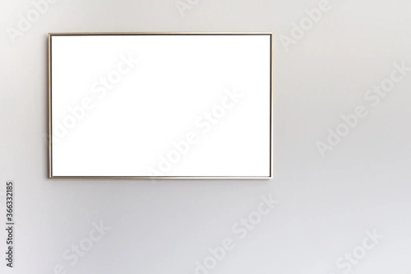 Obraz Thin picture frame on a gray wall. Isolated. Place for text or picture. High quality photo