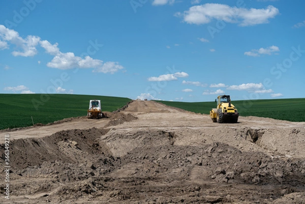 Obraz New road construction on a green field