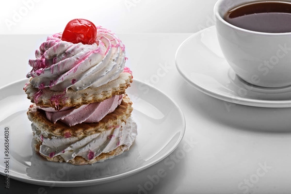 Fototapeta a cake with coffee on the table,