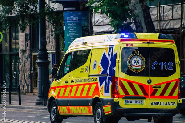 Obraz View of a traditional Hungarian ambulance driving through the streets of Budapest the capital and the most populous city of Hungary 