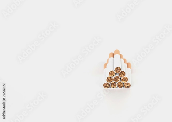 Fototapeta stack of cigarette on white background.