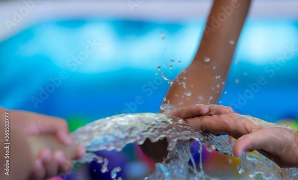 Fototapeta 3-4 year-old girls, ASEAN people playing in the inflatable pool