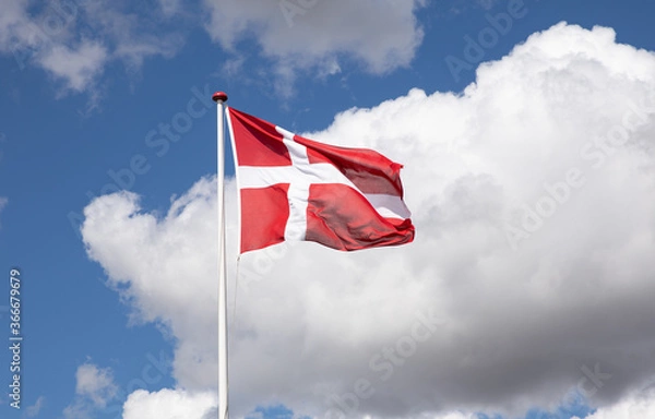 Obraz Danish flag with blue sky and clouds