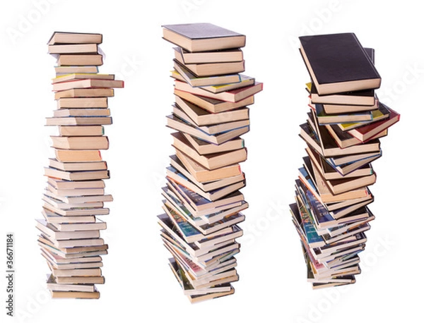 Fototapeta Three stacks of books isolated on white