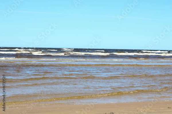 Fototapeta Coast of the Baltic Sea in Jurmala with white sand. Summer, spring relaxing on Sandy beach