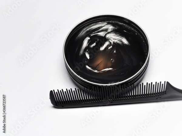 Fototapeta Hair pomade or waxe and comb isolated on white background