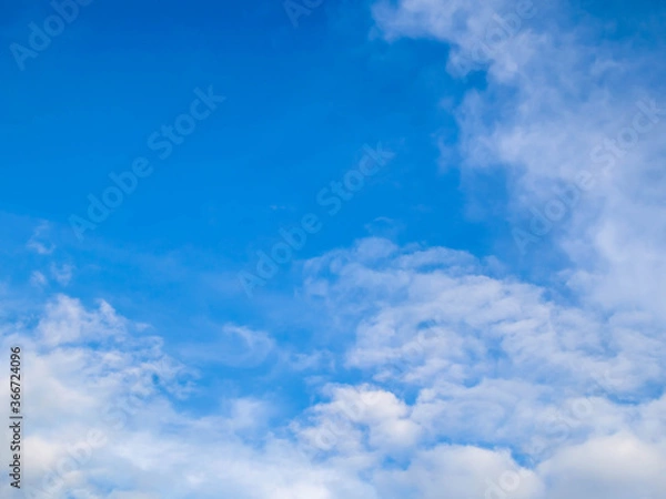 Obraz Blue sky background with tiny clouds. Blue sky background with clouds.