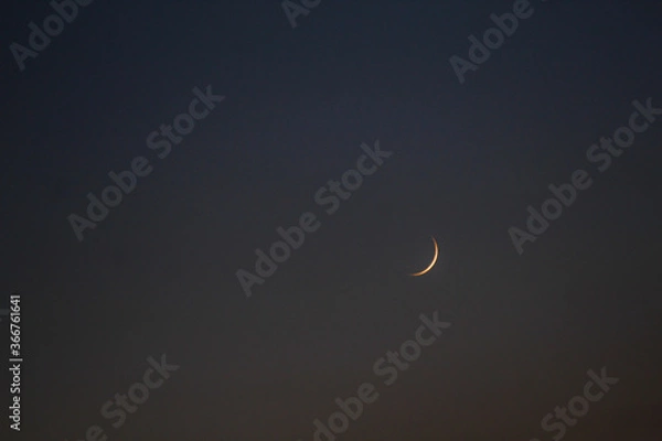 Obraz crescent moon over blue sky