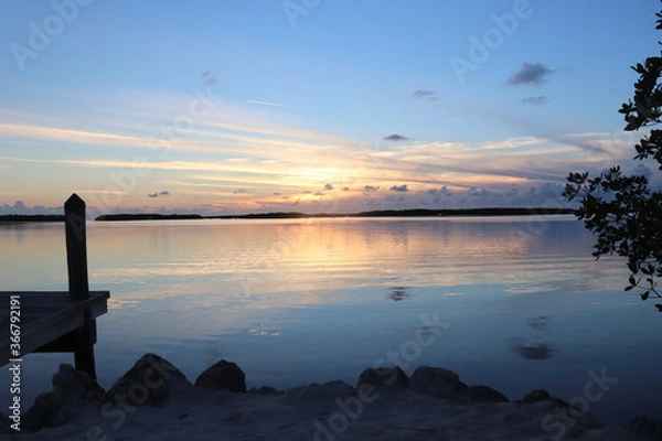 Obraz sunset over the water