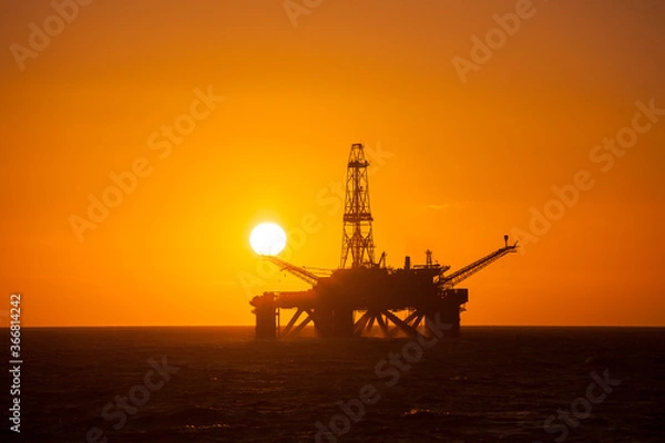 Obraz Oil rig at sunset time