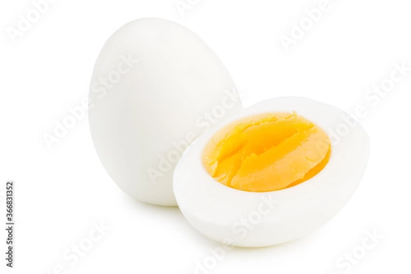 Fototapeta Single whole boiled egg with halved egg isolated on a white background