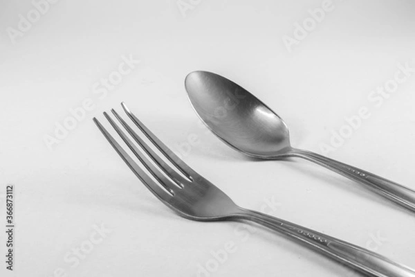 Obraz fork and spoon on white background
