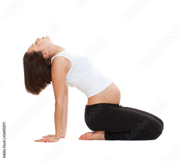 Obraz pregnant woman doing gymnastic