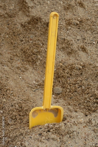 Fototapeta pelle dans le bac a sable