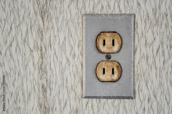 Fototapeta Two-hole socket on the wall.