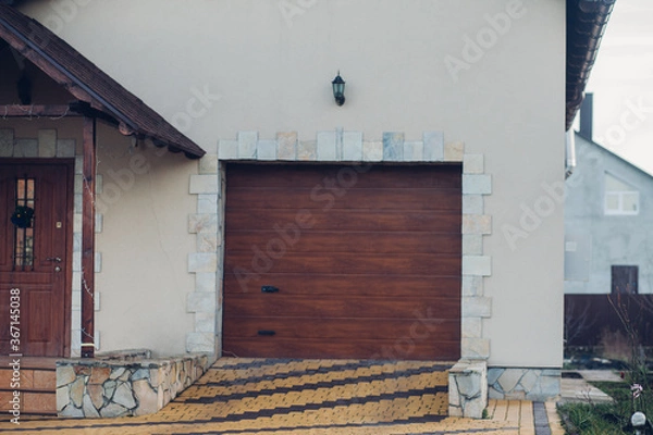 Fototapeta Stone pavement in perspective. Stone pavement texture. Granite cobblestoned pavement background. Abstract background of a cobblestone pavement