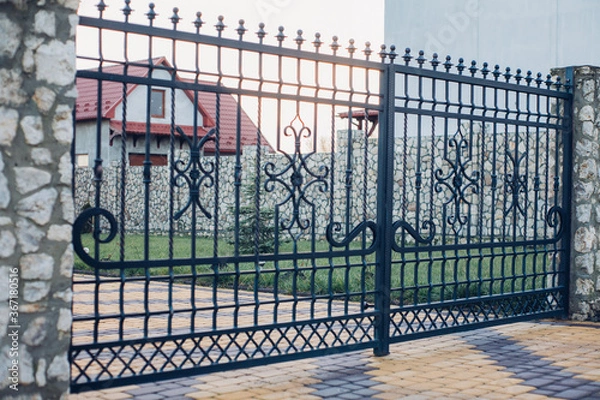 Fototapeta Stone pavement in perspective. Stone pavement texture. Granite cobblestoned pavement background. Abstract background of a cobblestone pavement