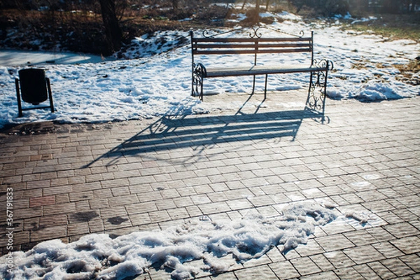 Fototapeta Nested pavers of various colors, around the grass is green, chic garden