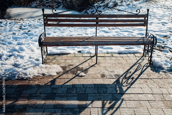 Fototapeta Nested pavers of various colors, around the grass is green, chic garden