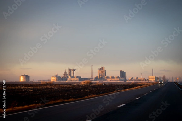 Obraz sunset over a factory
