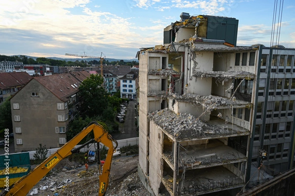 Fototapeta Aerial view of demolition building with crane