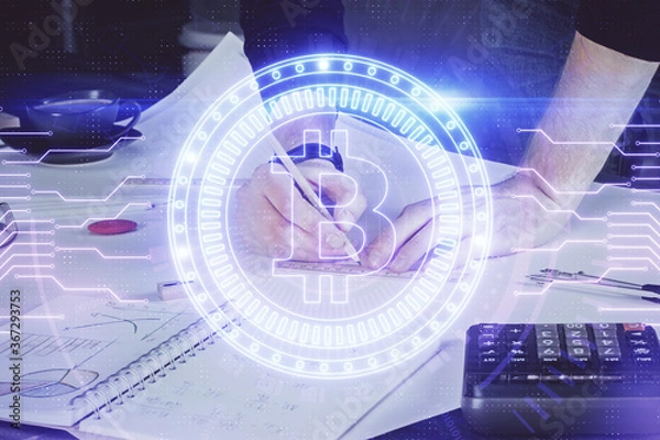 Fototapeta Man's hands working with notes background. Cryptocurrency and finance concept.