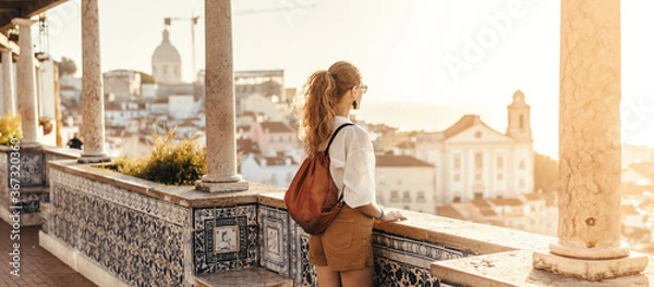 Obraz Person looking at breathtaking view of the city in Europe during the sunset