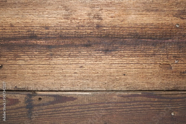 Fototapeta Part of an old wall made of wooden boards close up, background image