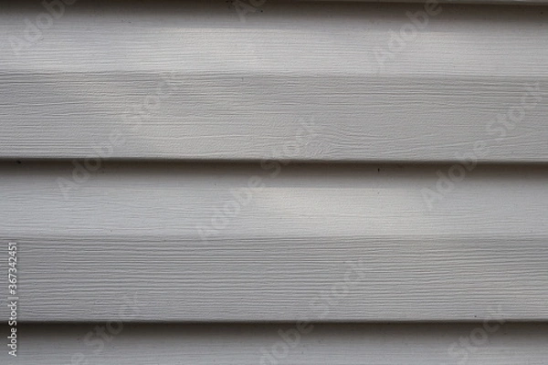 Fototapeta Part of wall from plastic siding close up, background image