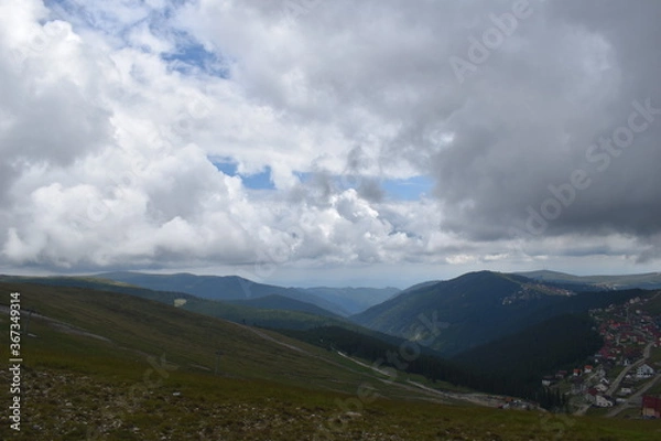 Fototapeta clouds over the mountains