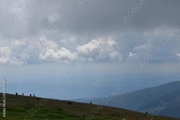 Fototapeta Storm clouds in the mountains