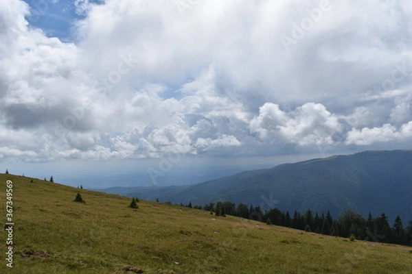 Fototapeta clouds over the mountains
