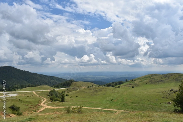 Fototapeta landscape with mountains and clouds