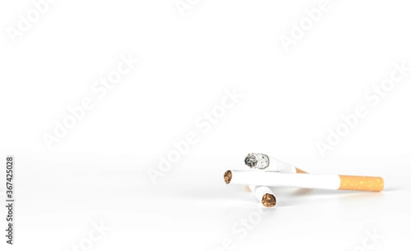 Fototapeta burning cigarette on white background with copy space.