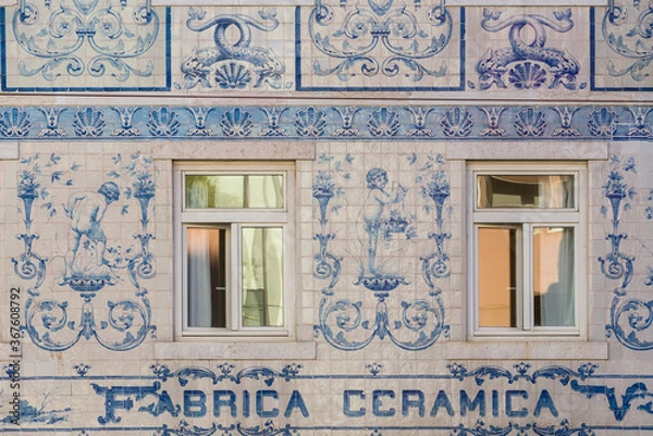 Fototapeta facade of a ceramic factory in blue and white azulejos in Lisbon Portugal