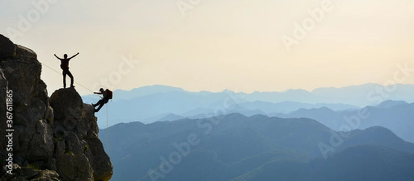 Obraz Crazy climbers doing rock climbing in the sunset
