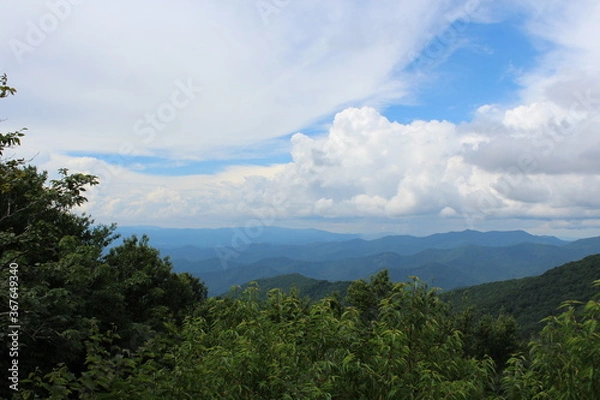Fototapeta clouds over the mountains