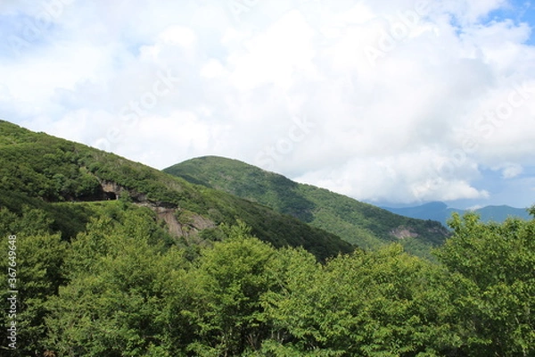 Fototapeta mountain landscape with clouds
