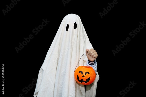 Obraz Halloween ghost costume with a basket of pumpkin. Isolated on black background.