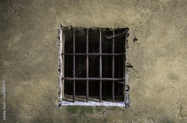 Obraz Old window with rusty bars