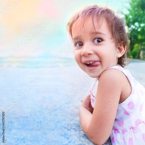 Obraz Closeup of cute laughing at camera. Funny girl shows her tongue. Square background, copy space