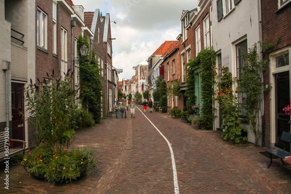 Obraz Deventer, Netherlands - July 11 2020: Famous Walstraat in the Dutch historic city center of Deventer
