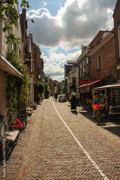 Obraz Deventer, Netherlands - July 11 2020: Famous Walstraat in the Dutch historic city center of Deventer