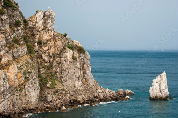 Fototapeta Rock "Sail" in the Crimea. View of the bay from the height of the cliff. Summer vacation concept.