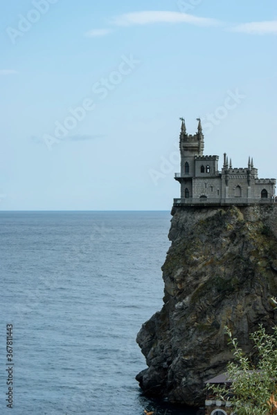 Fototapeta Swallow's nest. A small castle on top of a cliff.