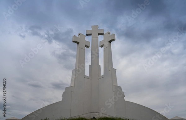 Fototapeta Three Crosses, a prominent monument in Vilnius, Lithuania, on the Bald Hill in Kalnai Park. According to a legend, seven Franciscan friars were beheaded on top of this hill.