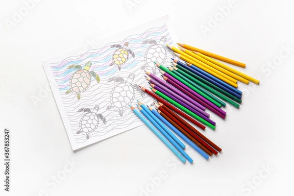 Fototapeta Coloring picture and pencils on white background