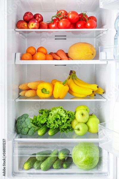 Obraz Open fridge full of vegetables and fruits