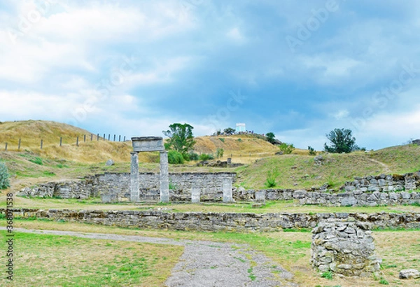 Fototapeta View of ancient columns and stones on the hills