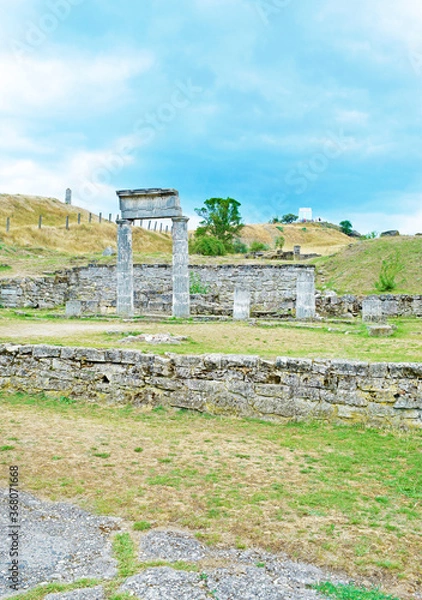Fototapeta View of ancient ruins and columns on the hills